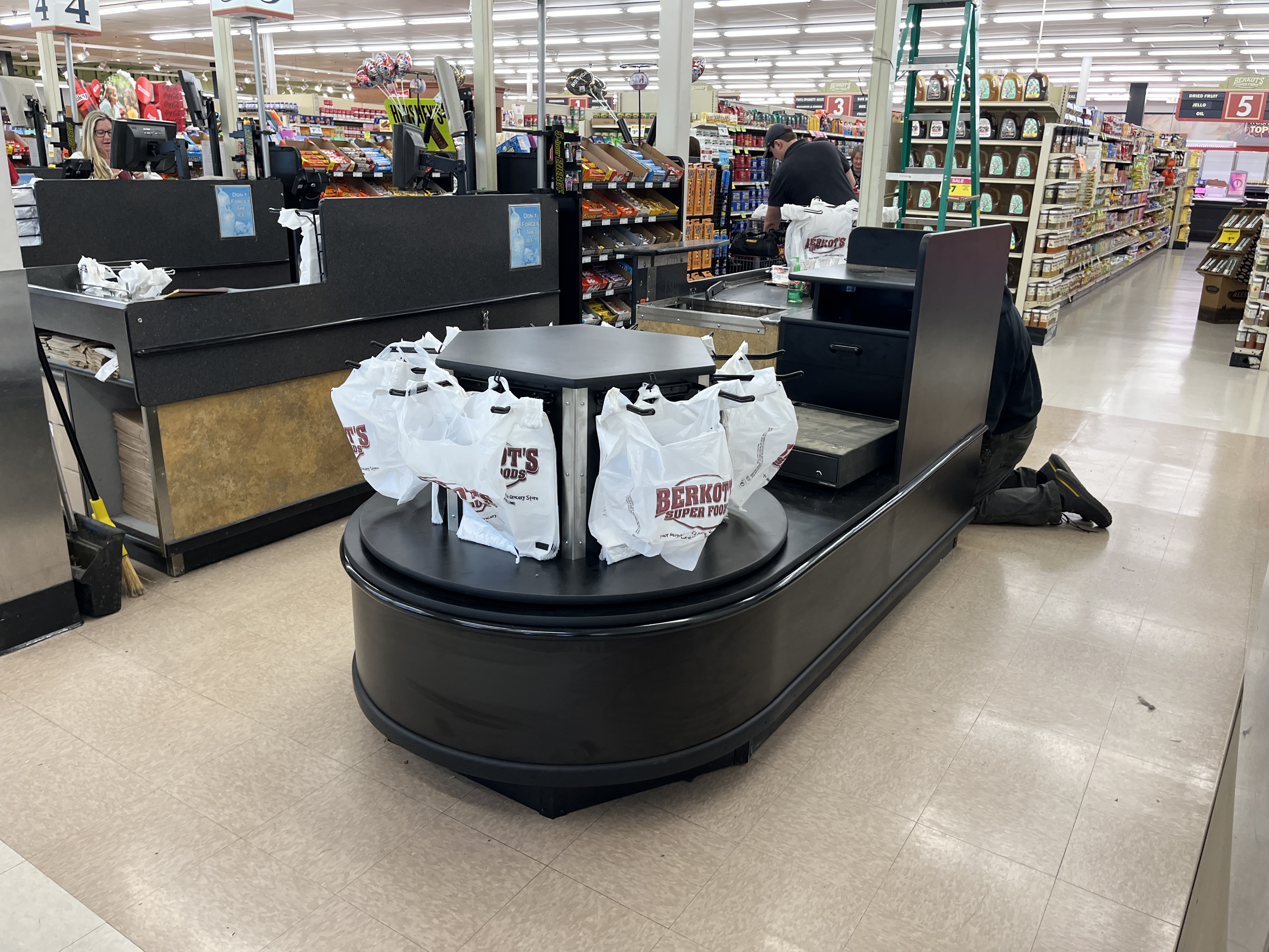 grocery store checkout lane manufacturer